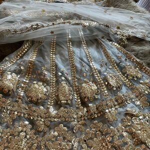 Elegant Gold and Silver Embroidered lengha with drupattie scarf in organza